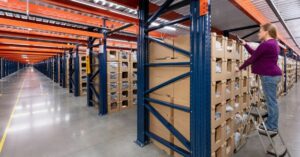 woman scanning products in a fulfillment center